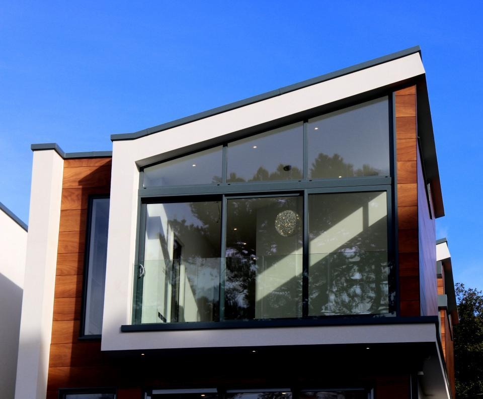 A modern home with a large glass facade